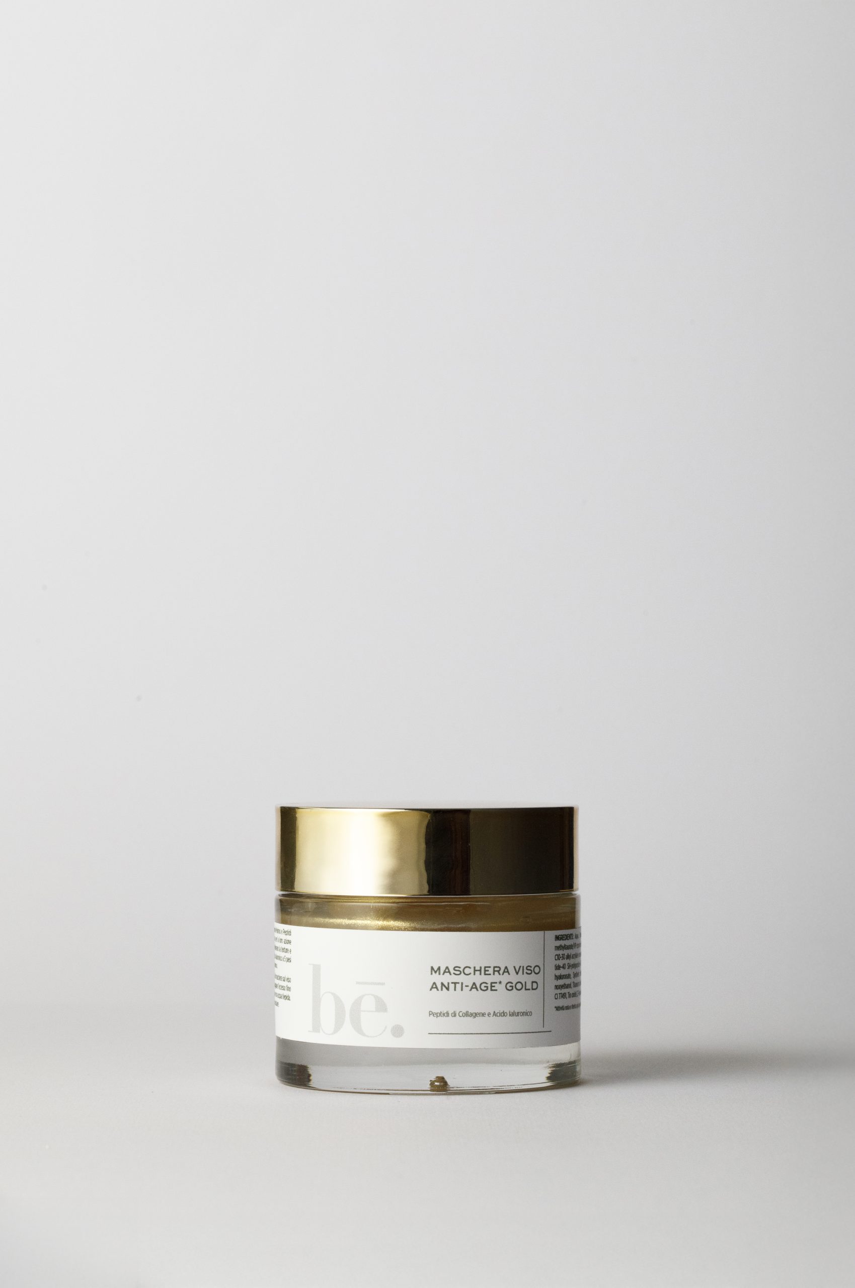 Vasetto della maschera viso Anti-Age Gold bē. su sfondo chiaro